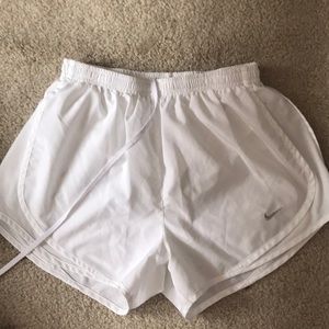 White Nike shorts